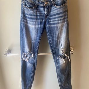 Buckle Black distressed skinny jeans